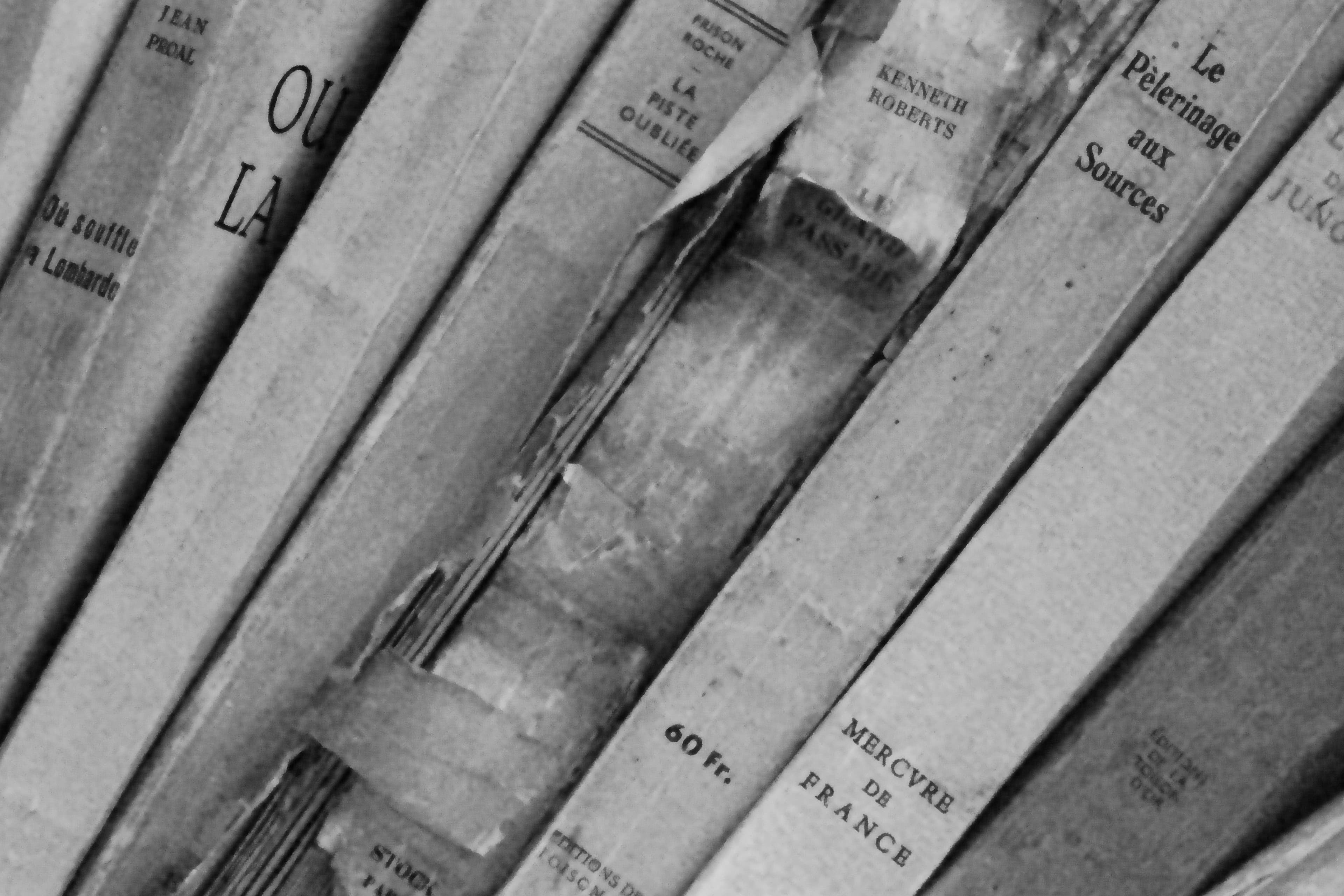Vintage hardback books with aged spines